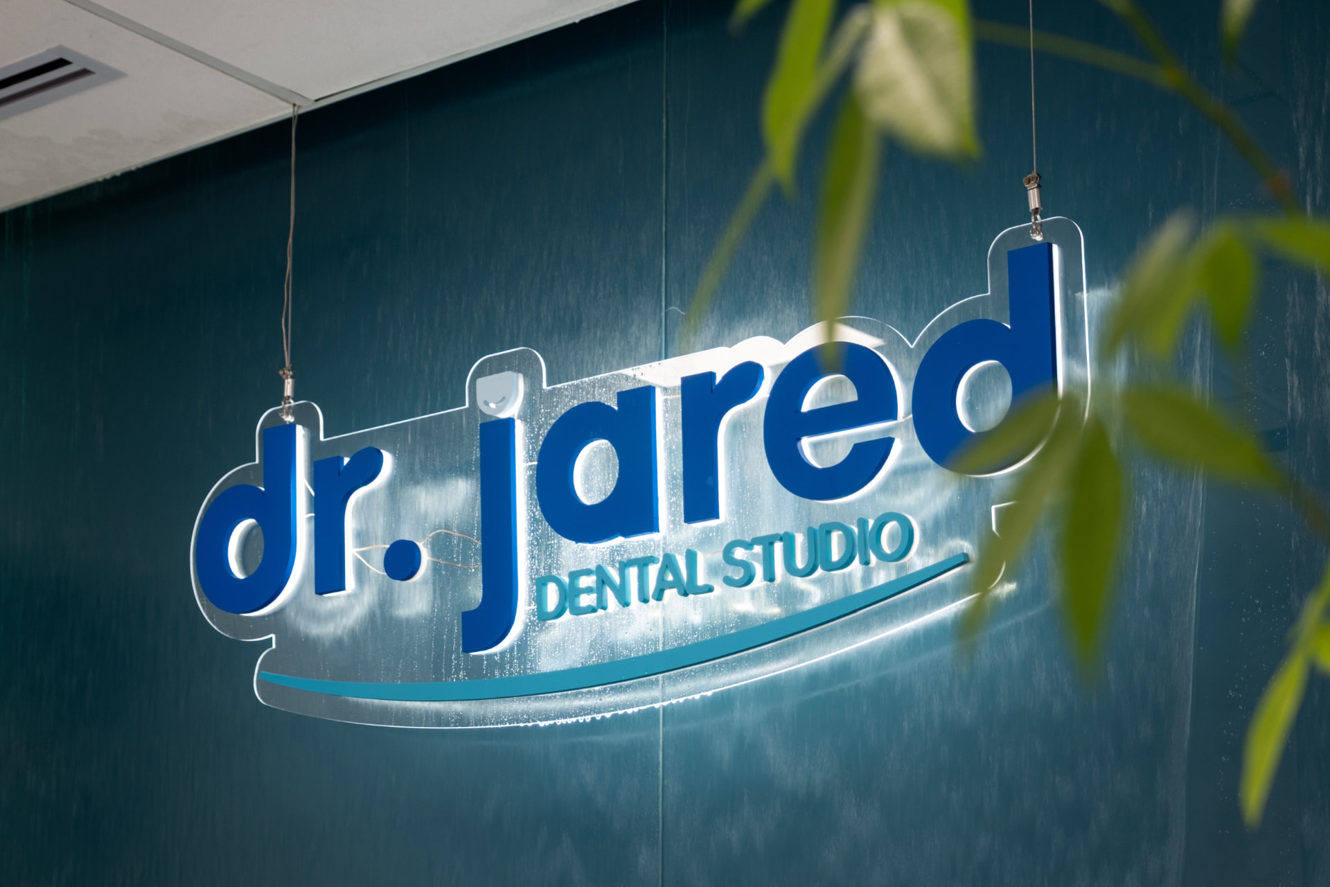 Illuminated Dr Jared Dental Studio sign